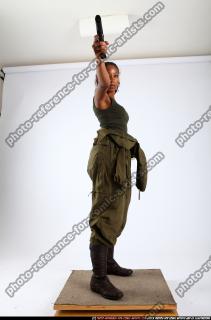 jenna-standing-shooting-pistol