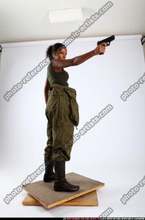 jenna-standing-shooting-pistol