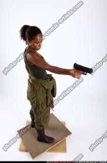 jenna-standing-shooting-pistol