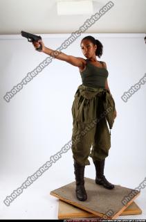 jenna-standing-shooting-pistol