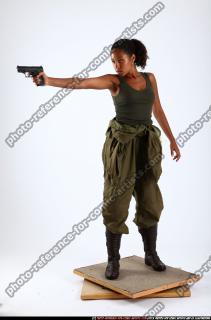 jenna-standing-shooting-pistol