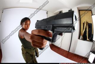 jenna-standing-shooting-pistol