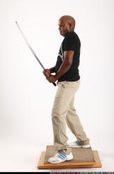 Man Old Chubby Black Fighting with sword Standing poses Casual