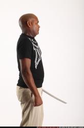 Man Old Chubby Black Fighting with sword Standing poses Casual