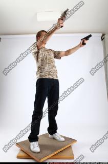 2011 01 PATRICK STANDING DUAL PISTOLS 07 C