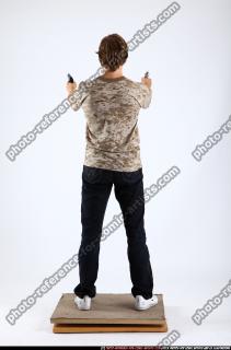 2011 01 PATRICK STANDING DUAL PISTOLS 04 B