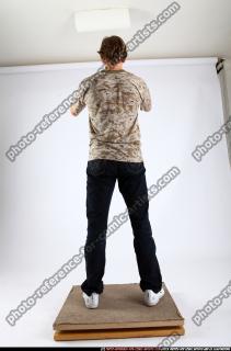 2011 01 PATRICK STANDING DUAL PISTOLS 04 C