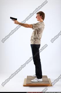 2011 01 PATRICK STANDING DUAL PISTOLS 02 B