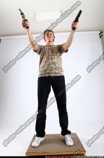 2011 01 PATRICK STANDING DUAL PISTOLS 00 C