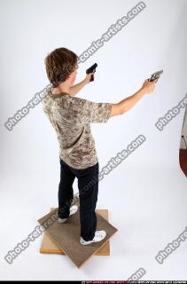 patrick-standing-dual-pistols