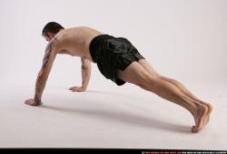 Man Adult Athletic White Fitness poses Moving poses Sportswear