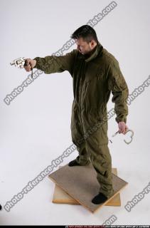 2011 01 JANISONE STANDING REVOLVER CUFFS 01 A