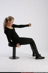 Woman Adult Athletic White Daily activities Sitting poses Casual