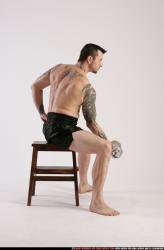 Man Adult Athletic White Fitness poses Sitting poses Sportswear