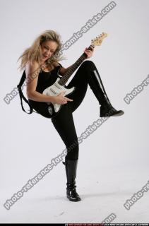 BETHANY_ROBERTS-PLAYING-GUITAR