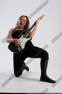 BETHANY_ROBERTS-PLAYING-GUITAR