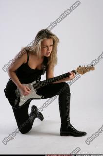 BETHANY_ROBERTS-PLAYING-GUITAR