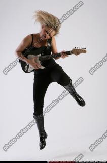 BETHANY_ROBERTS-PLAYING-GUITAR