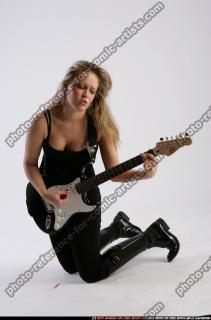 BETHANY_ROBERTS-PLAYING-GUITAR