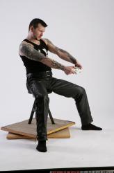 Man Adult Athletic White Daily activities Sitting poses Casual