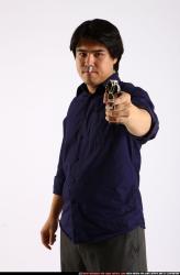 Man Adult Average Fighting with gun Standing poses Business Asian