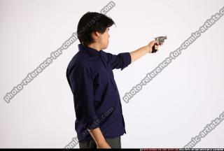 liam-standing-aiming-revolver