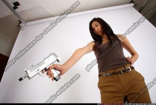 naomi-aiming-uzi