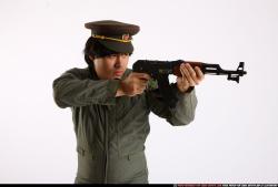 Man Adult Average Fighting with submachine gun Detailed photos Army Asian