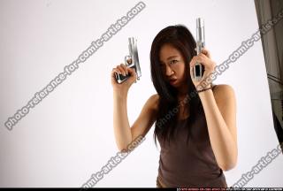 2011 09 NAOMI DUAL PISTOLS POSE1 10
