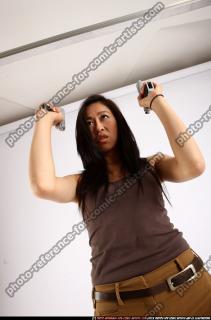 2011 09 NAOMI DUAL PISTOLS POSE1 11