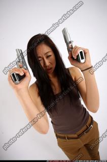 2011 09 NAOMI DUAL PISTOLS POSE1 12