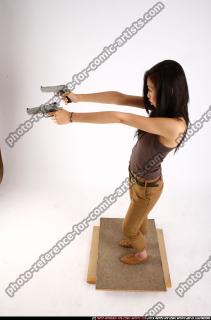 2011 09 NAOMI DUAL PISTOLS POSE2 02 A