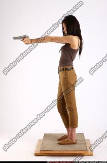 2011 09 NAOMI DUAL PISTOLS POSE2 02 B