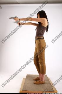2011 09 NAOMI DUAL PISTOLS POSE2 02 C