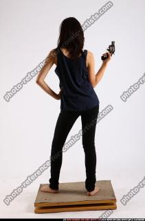 naomi-revolver-pose
