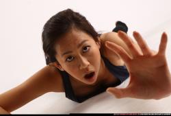 Woman Young Athletic Neutral Laying poses Casual Asian