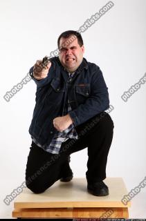 2012 01 SLAVOJ KNEELING REVOLVER SHOOTING 00