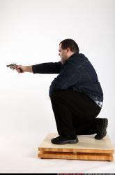 Man Adult Chubby White Fighting with gun Kneeling poses Casual