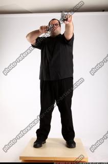 2012 02 SLAVOJ DUAL GUNS POSE1 00 C