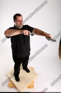 2012 02 SLAVOJ DUAL GUNS POSE1 01 A