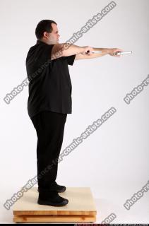 Slavoj-dual-guns-pose1