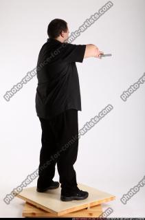Slavoj-dual-guns-pose1