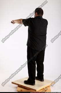 Slavoj-dual-guns-pose1