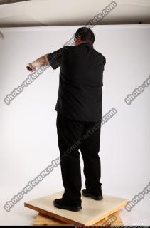 Slavoj-dual-guns-pose1
