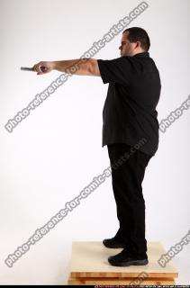 Slavoj-dual-guns-pose1