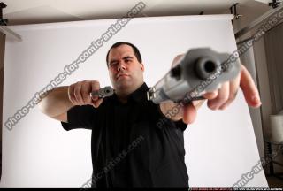 Slavoj-dual-guns-pose1