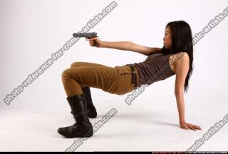 2012 02 NAOMI PISTOL POSE1 02
