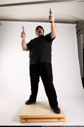 SLAVOJ_SLAVOJ MOBSTER-DUAL-GUNS-POSE2