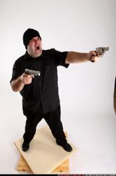 SLAVOJ_SLAVOJ MOBSTER-DUAL-GUNS-POSE2