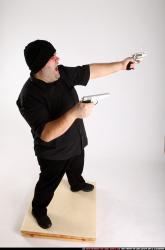 SLAVOJ_SLAVOJ MOBSTER-DUAL-GUNS-POSE2